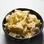 a bowl of food that is on a table